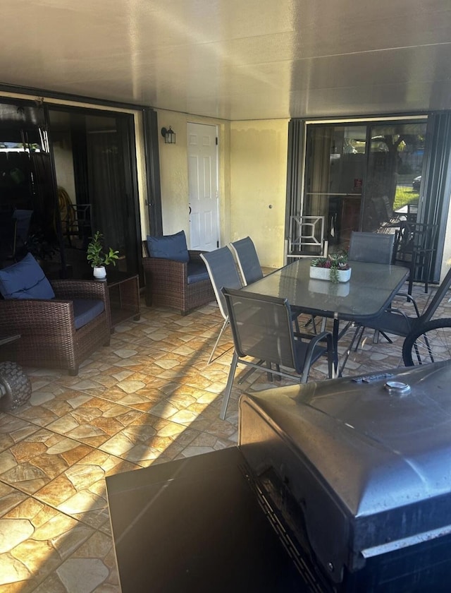 341 Lake Arbor Dr, Palm Springs, FL 33461 - view of patio with outdoor dining area