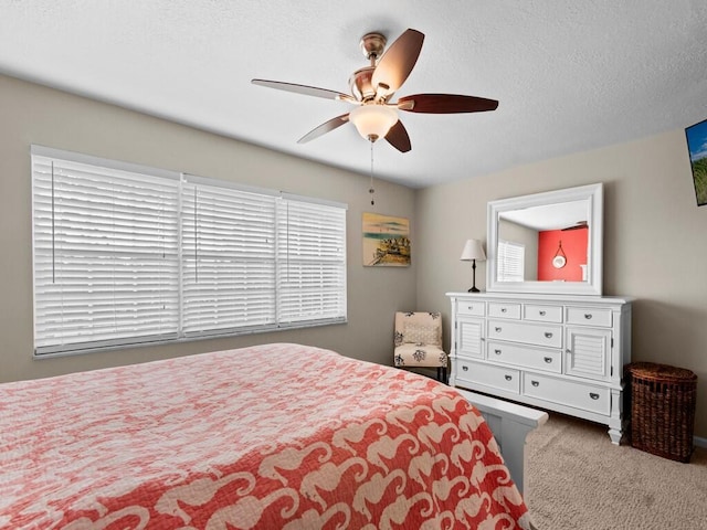 bedroom with carpet and a ceiling fan