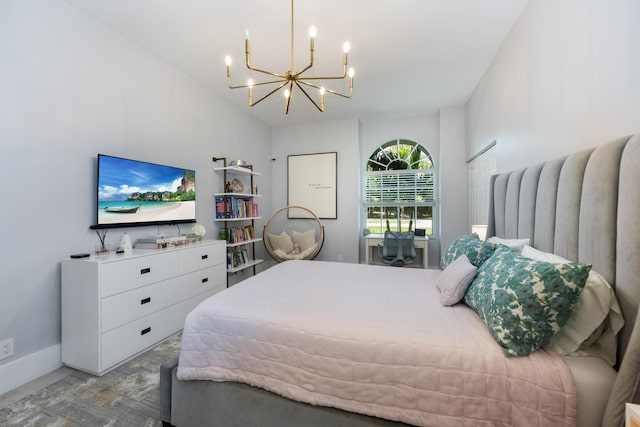 bedroom with a chandelier