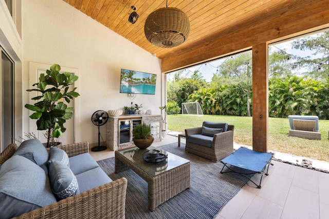 view of patio / terrace with wine cooler and an outdoor living space
