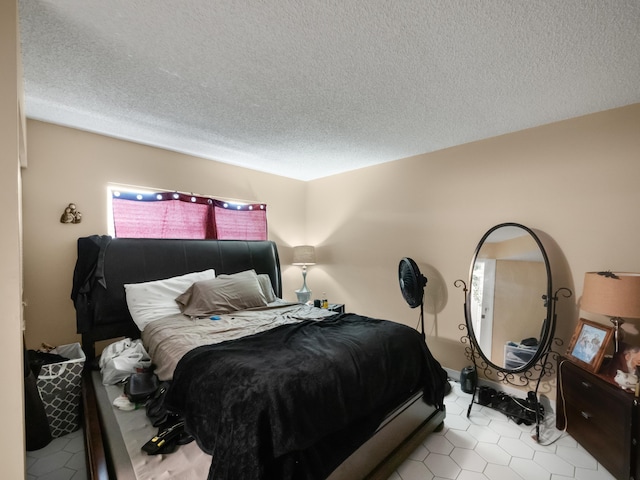 3755 Via Poinciana Unit 203, Lake Worth, FL 33467 - bedroom with a textured ceiling