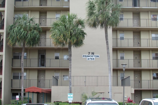 3755 Via Poinciana Unit 203, Lake Worth, FL 33467 - view of apartment building / complex