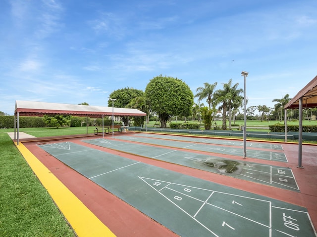 3755 Via Poinciana Unit 203, Lake Worth, FL 33467 - view of community featuring shuffleboard