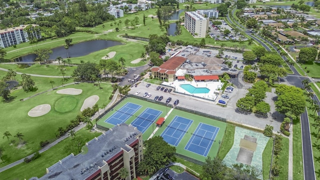 3755 Via Poinciana Unit 203, Lake Worth, FL 33467 - aerial view of property's location with a large body of water, a golf course, apartment complex / building, and a pool area