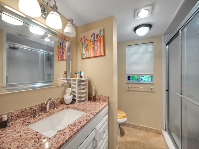 3755 Via Poinciana Unit 203, Lake Worth, FL 33467 - bathroom featuring a shower stall, toilet, and vanity