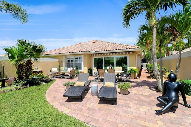 5021 Magnolia Bay Cir, Palm Beach Gardens, FL 33418 - view of patio / terrace featuring fence, outdoor dining area, and an outdoor living space