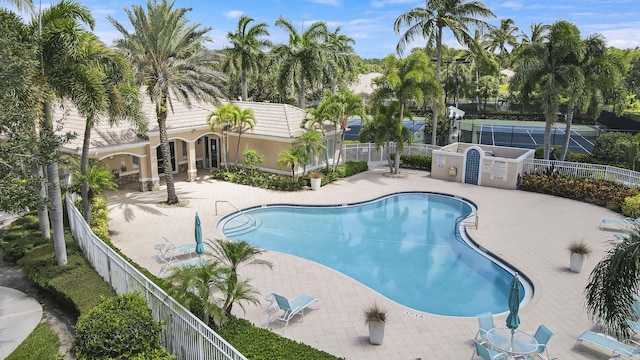 5021 Magnolia Bay Cir, Palm Beach Gardens, FL 33418 - community pool featuring fence and a patio area