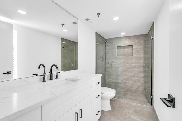 full bathroom featuring a shower stall, recessed lighting, toilet, and vanity