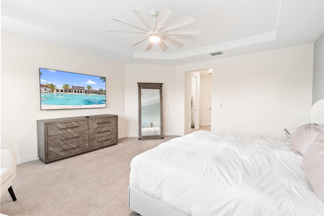 8640 E Baypoint Cir, Parkland, FL 33076 - carpeted bedroom with a raised ceiling, ceiling fan, and baseboards