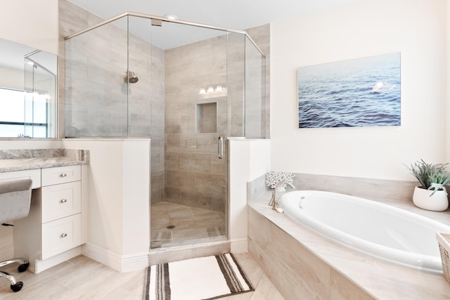 8640 E Baypoint Cir, Parkland, FL 33076 - full bathroom featuring a bath, a stall shower, vanity, and tile patterned floors