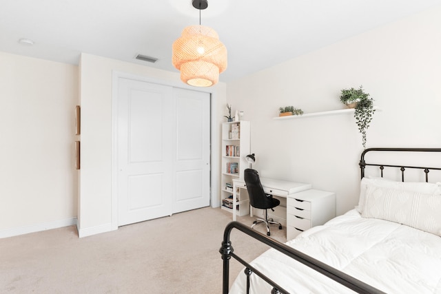 8640 E Baypoint Cir, Parkland, FL 33076 - bedroom with light colored carpet, a closet, baseboards, and an office area