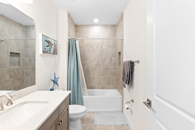 8640 E Baypoint Cir, Parkland, FL 33076 - bathroom featuring shower / bath combo, vanity, tile patterned flooring, and toilet