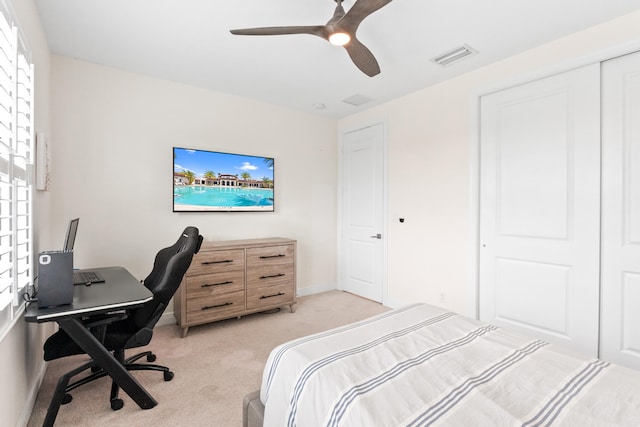8640 E Baypoint Cir, Parkland, FL 33076 - bedroom with light carpet, a desk, ceiling fan, and baseboards