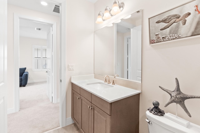 8640 E Baypoint Cir, Parkland, FL 33076 - bathroom with vanity, toilet, and baseboards