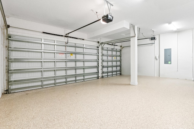 8640 E Baypoint Cir, Parkland, FL 33076 - garage with electric panel and a garage door opener