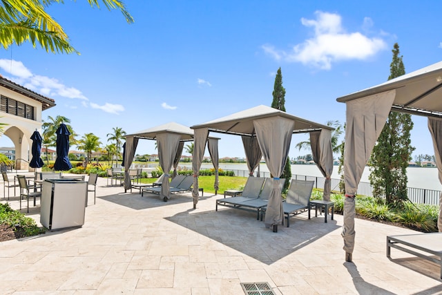 8640 E Baypoint Cir, Parkland, FL 33076 - view of patio featuring a gazebo and fence