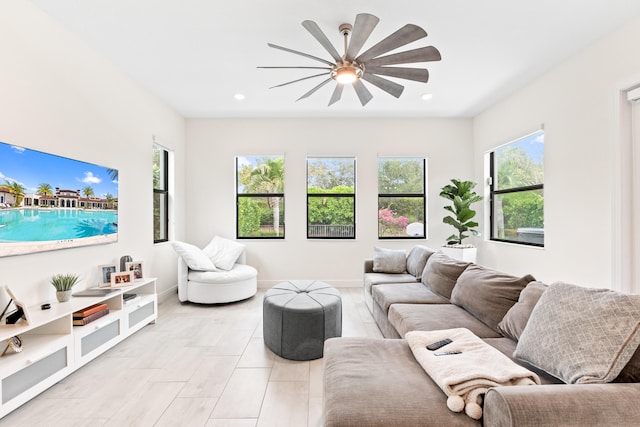 8640 E Baypoint Cir, Parkland, FL 33076 - living room featuring ceiling fan and recessed lighting