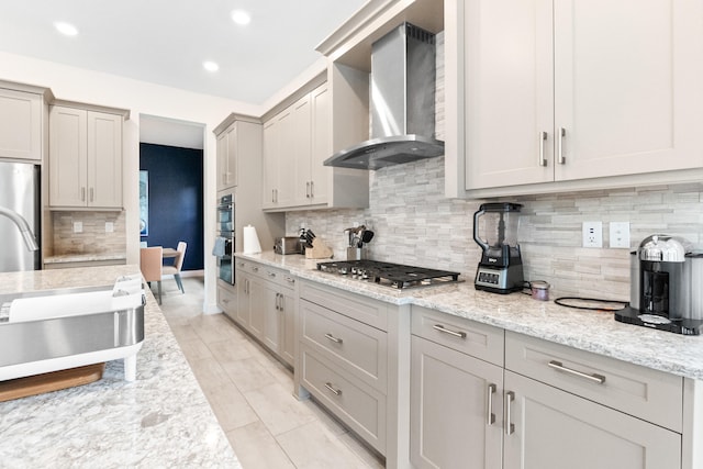 8640 E Baypoint Cir, Parkland, FL 33076 - kitchen with wall chimney exhaust hood, stainless steel appliances, tasteful backsplash, recessed lighting, and a sink