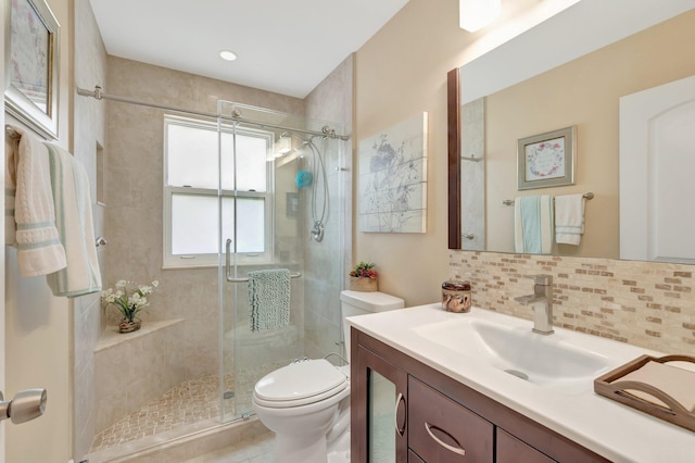 1420 NW 27th Ave, Delray Beach, FL 33445 - full bathroom featuring toilet, tasteful backsplash, a stall shower, and vanity