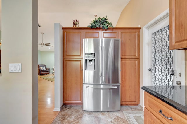 1420 NW 27th Ave, Delray Beach, FL 33445 - kitchen featuring stainless steel fridge with ice dispenser, dark stone counters, and ceiling fan