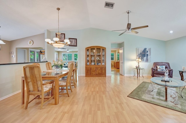 1420 NW 27th Ave, Delray Beach, FL 33445 - dining area featuring lofted ceiling, a chandelier, light wood finished floors, ceiling fan, and baseboards