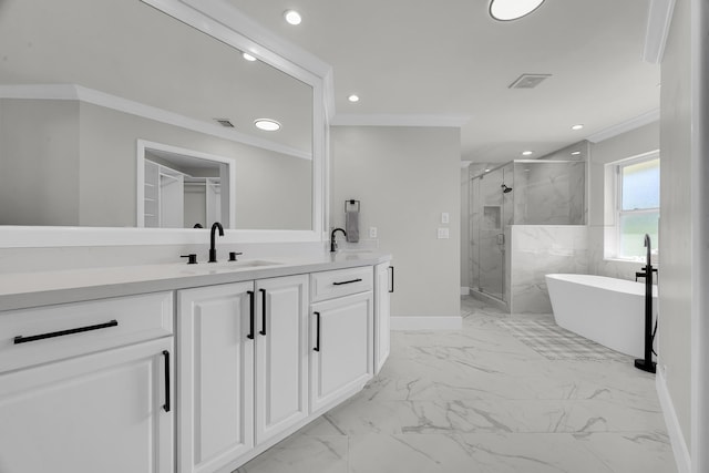 full bath with marble look tiles, crown molding, a marble finish shower, recessed lighting, and vanity