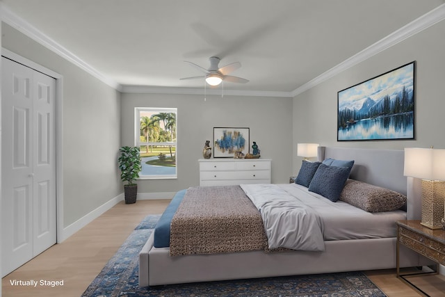 4365 SW Bimini Cir S, Palm City, FL 34990 - bedroom featuring crown molding, light wood finished floors, baseboards, and ceiling fan