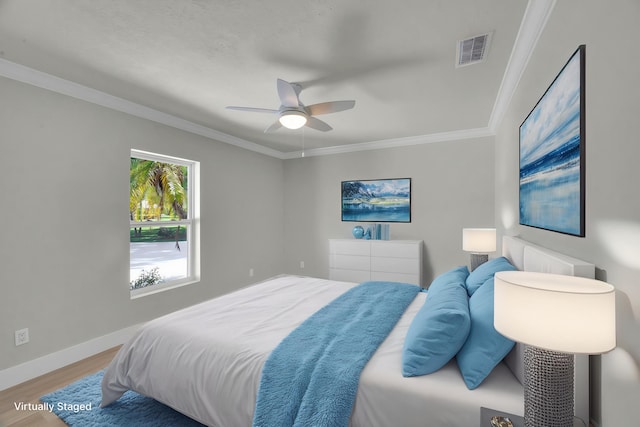 4365 SW Bimini Cir S, Palm City, FL 34990 - bedroom featuring wood finished floors, baseboards, ornamental molding, and ceiling fan