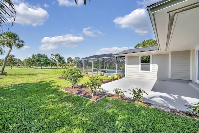 view of green lawn featuring a patio, an outdoor pool, and glass enclosure
