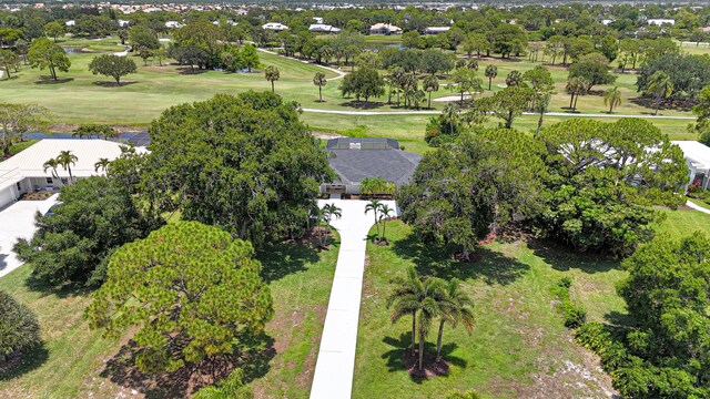 4365 SW Bimini Cir S, Palm City, FL 34990 - drone / aerial view of a golf club and a tree filled landscape