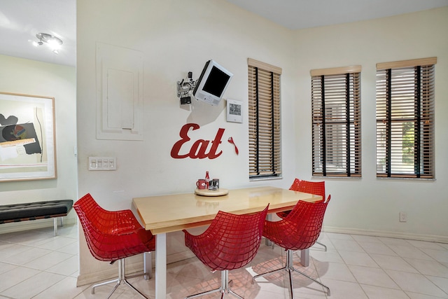 17652 Ashbourne D Way Unit D, Boca Raton, FL 33496 - dining room featuring light tile patterned floors and baseboards