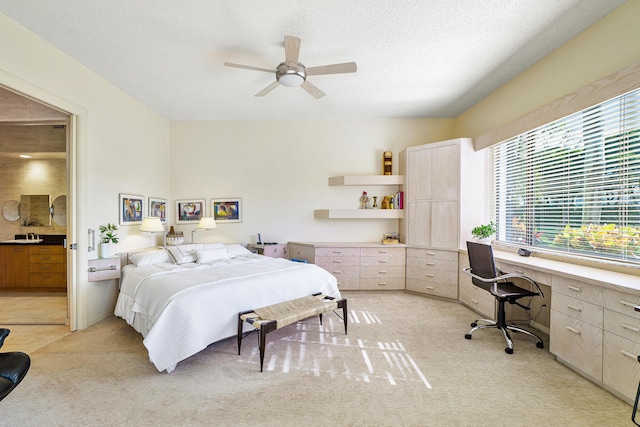 17652 Ashbourne D Way Unit D, Boca Raton, FL 33496 - bedroom featuring light carpet, a textured ceiling, and a ceiling fan