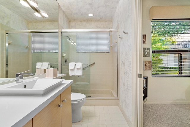 17652 Ashbourne D Way Unit D, Boca Raton, FL 33496 - full bathroom with toilet, a shower stall, vanity, tile patterned flooring, and baseboards