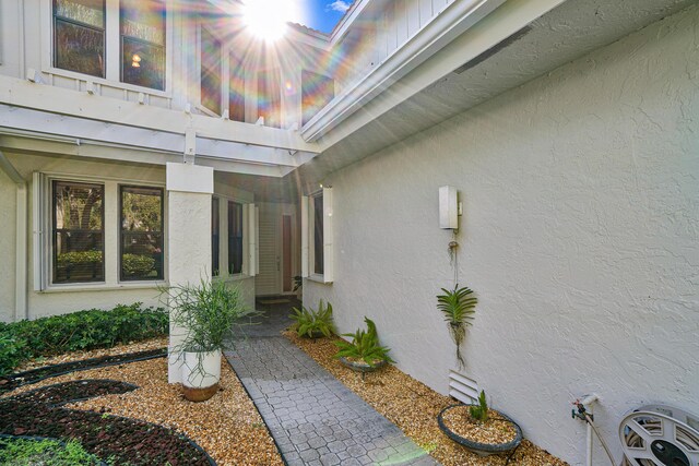 17652 Ashbourne D Way Unit D, Boca Raton, FL 33496 - property entrance with stucco siding