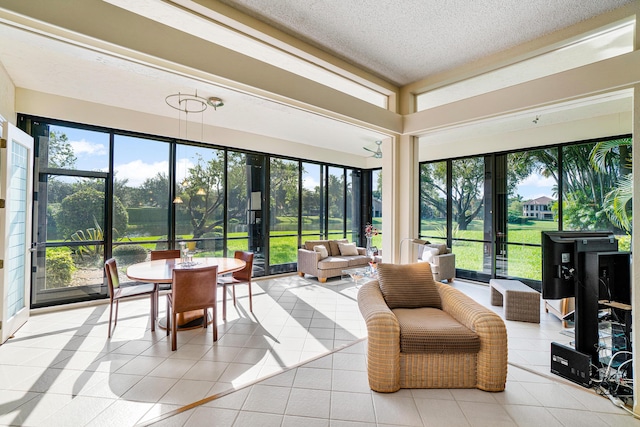 17652 Ashbourne D Way Unit D, Boca Raton, FL 33496 - sunroom with plenty of natural light, tile patterned flooring, and a textured ceiling