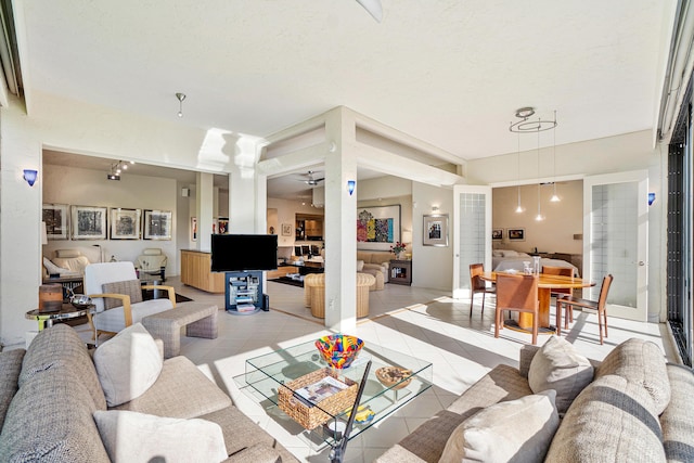 17652 Ashbourne D Way Unit D, Boca Raton, FL 33496 - living room featuring light tile patterned flooring