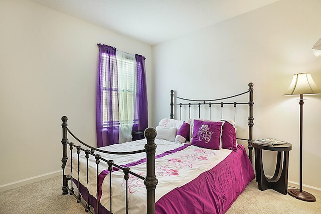 6241 NW Regent St, Port Saint Lucie, FL 34983 - bedroom featuring carpet and baseboards