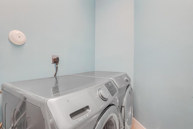 3009 Hop Tree Way, Riviera Beach, FL 33410 - laundry room featuring washer and clothes dryer