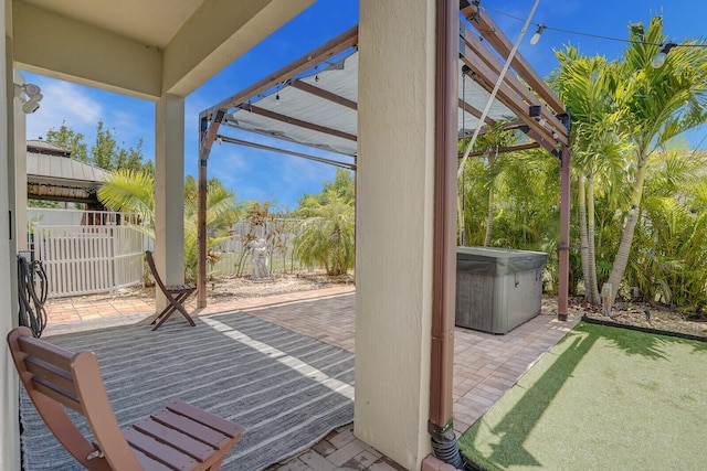 3009 Hop Tree Way, Riviera Beach, FL 33410 - view of patio featuring a hot tub, a pergola, and fence