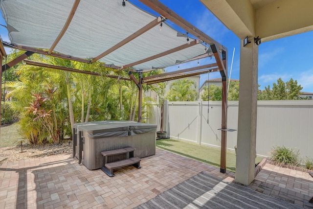 3009 Hop Tree Way, Riviera Beach, FL 33410 - view of patio / terrace featuring a hot tub, a gate, a fenced backyard, and a pergola