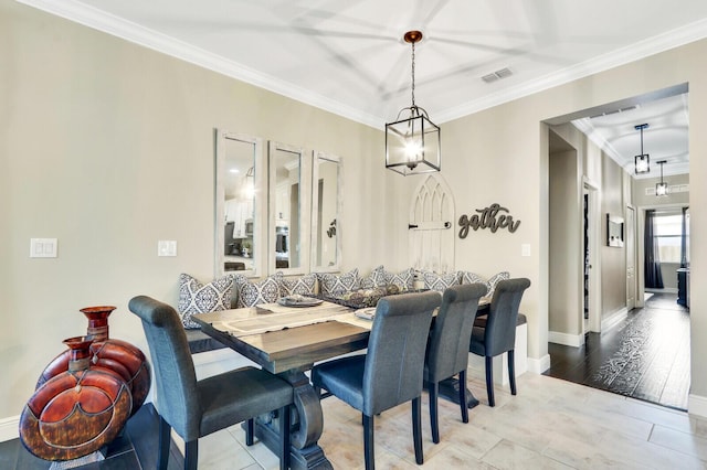 4052 SW Mccandless St, Port Saint Lucie, FL 34953 - dining room featuring ornamental molding and baseboards