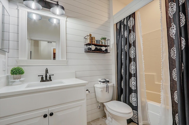 4052 SW Mccandless St, Port Saint Lucie, FL 34953 - full bath featuring toilet, vanity, wooden walls, and shower / bathtub combination with curtain