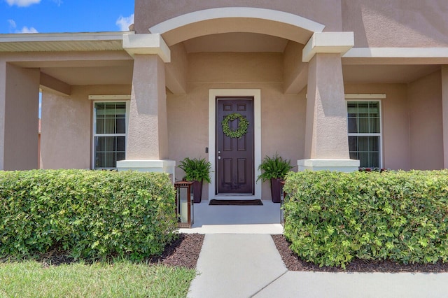 4052 SW Mccandless St, Port Saint Lucie, FL 34953 - entrance to property with stucco siding