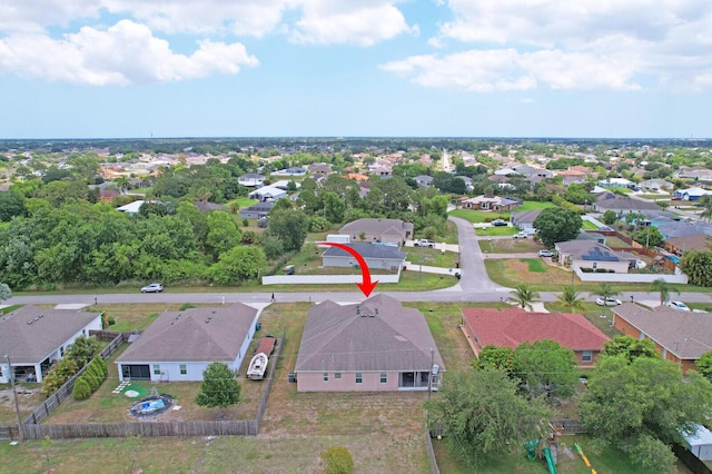 4052 SW Mccandless St, Port Saint Lucie, FL 34953 - aerial view of property's location with nearby suburban area