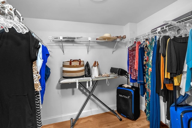 2480 Presidential Way Unit 303, West Palm Beach, FL 33401 - walk in closet featuring wood finished floors