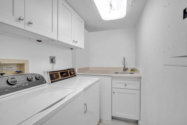 2480 Presidential Way Unit 303, West Palm Beach, FL 33401 - washroom with separate washer and dryer, cabinet space, and light marble finish flooring