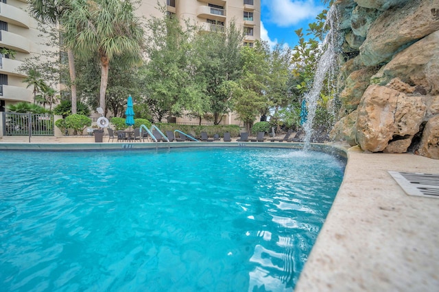 2480 Presidential Way Unit 303, West Palm Beach, FL 33401 - community pool featuring fence