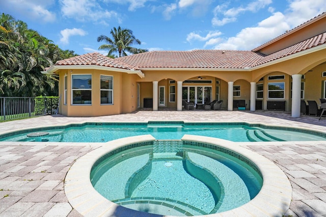 8380 Woodsmuir Dr, West Palm Beach, FL 33412 - view of pool with a patio, a pool with connected hot tub, and ceiling fan