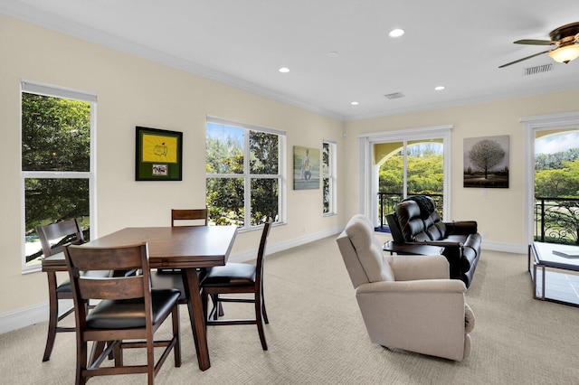 8380 Woodsmuir Dr, West Palm Beach, FL 33412 - dining space with light carpet, baseboards, crown molding, and recessed lighting