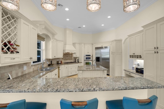 8380 Woodsmuir Dr, West Palm Beach, FL 33412 - kitchen featuring a sink, stainless steel appliances, light stone counters, backsplash, and recessed lighting